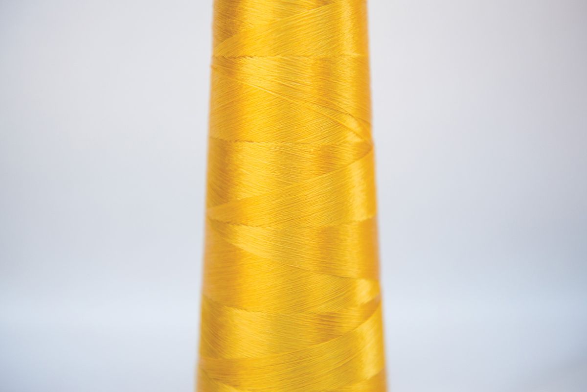 Spools of yellow Microsilk fibers. Spools of yellow Microsilk fibers.