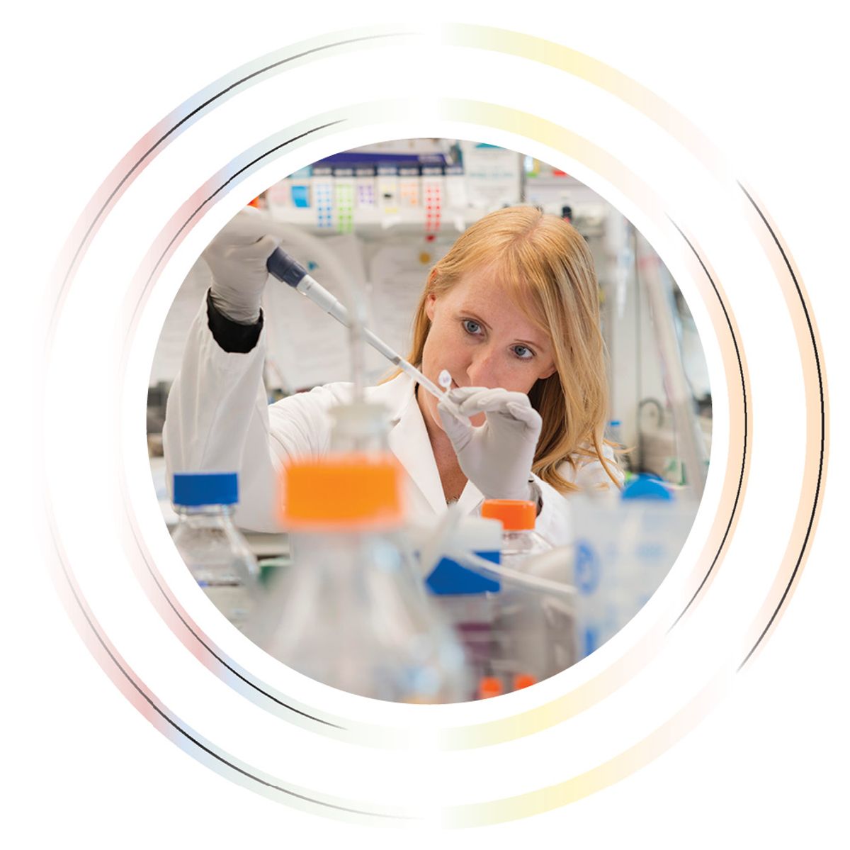 Image of a woman holding a pipette and a microcentrifuge tube in the laboratory. Image of a woman holding a pipette and a microcentrifuge tube in the laboratory.